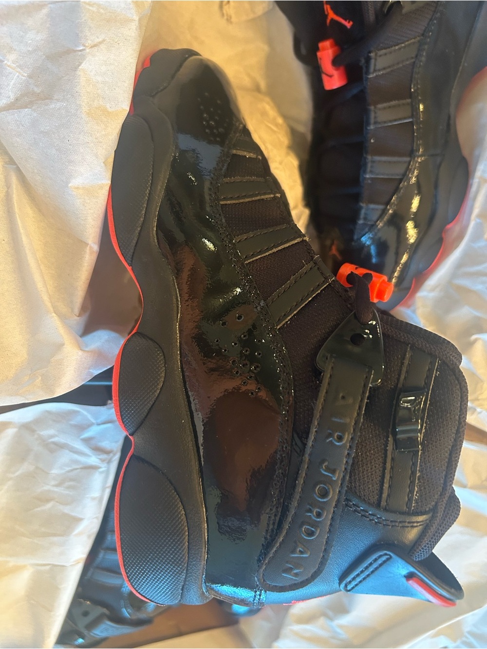 Jordan Men’s Black with Red Accents Patent Leather Basketball Shoes